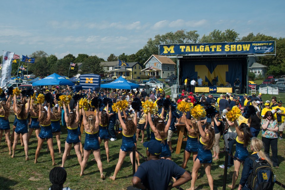 Wolverine fans enjoying the band and cheerleaders - courtesy of Mlive.com