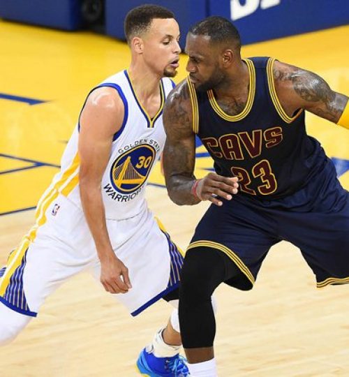 June 2, 2016; Oakland, CA, USA; Cleveland Cavaliers forward LeBron James (23) controls the ball against Golden State Warriors  Stephen Curry (30) during the first half in game one of the NBA Finals at Oracle Arena. Mandatory Credit: Bob Donnan-USA TODAY Sports